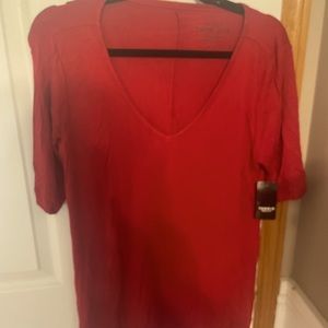Brand new with tags red t- shirt.